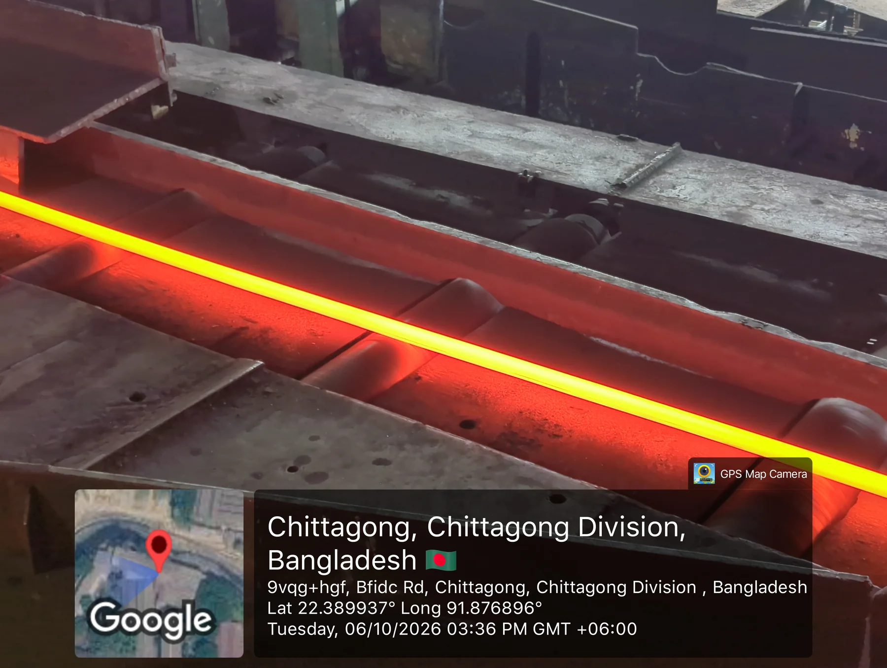 Hot steel moving along the production line at Surprise Industrial Corporation.