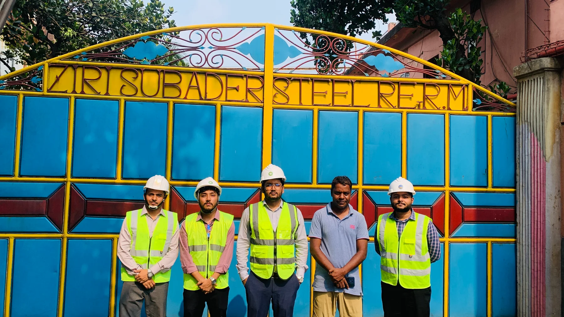 Site team at the entrance of Ziri Subader Steel Re-rolling Mill.